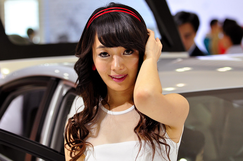 Illustration for article titled 2009 Seoul Motor Show: Kimchi-Flavored Booth Professionals